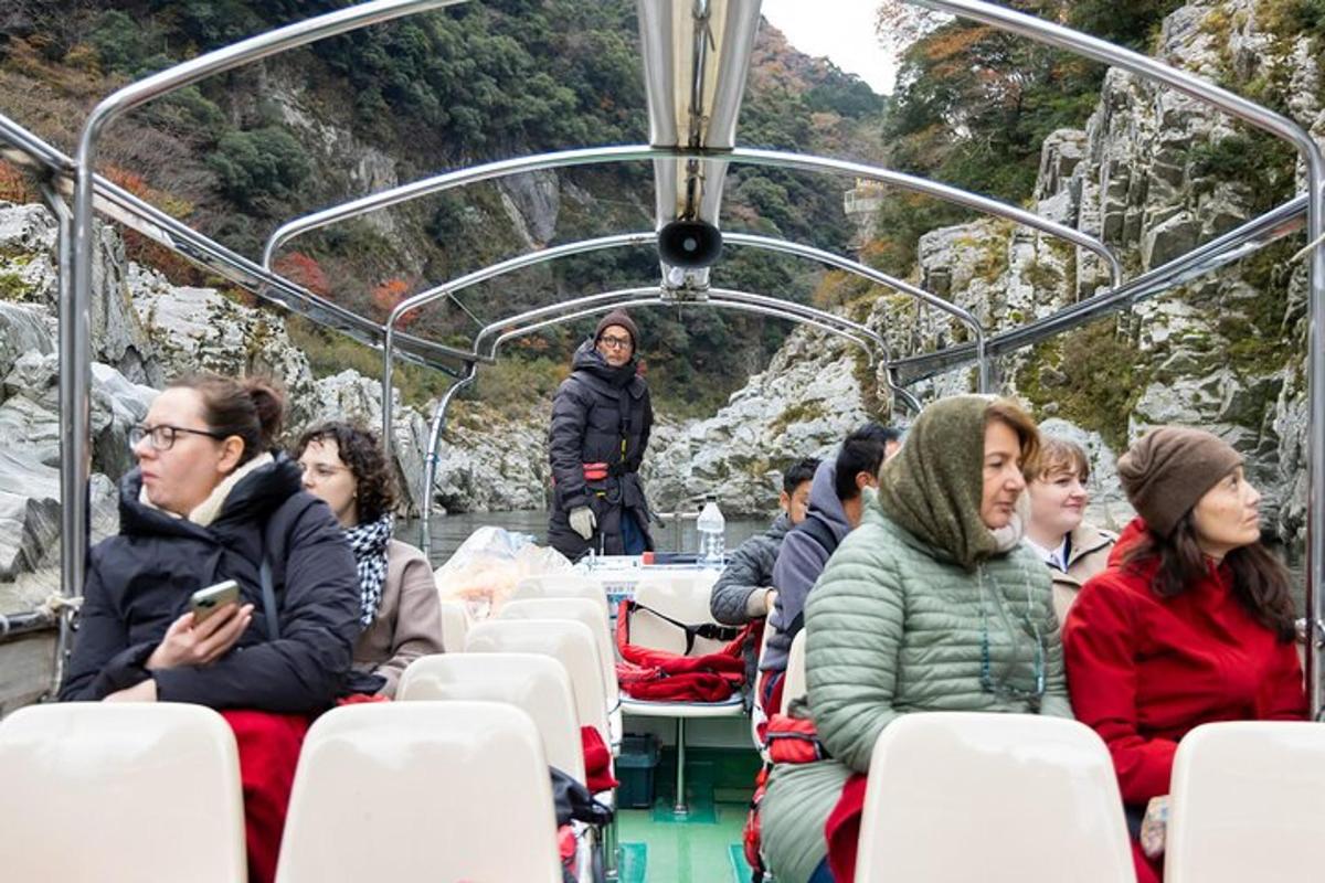 a group of people sitting on a boat