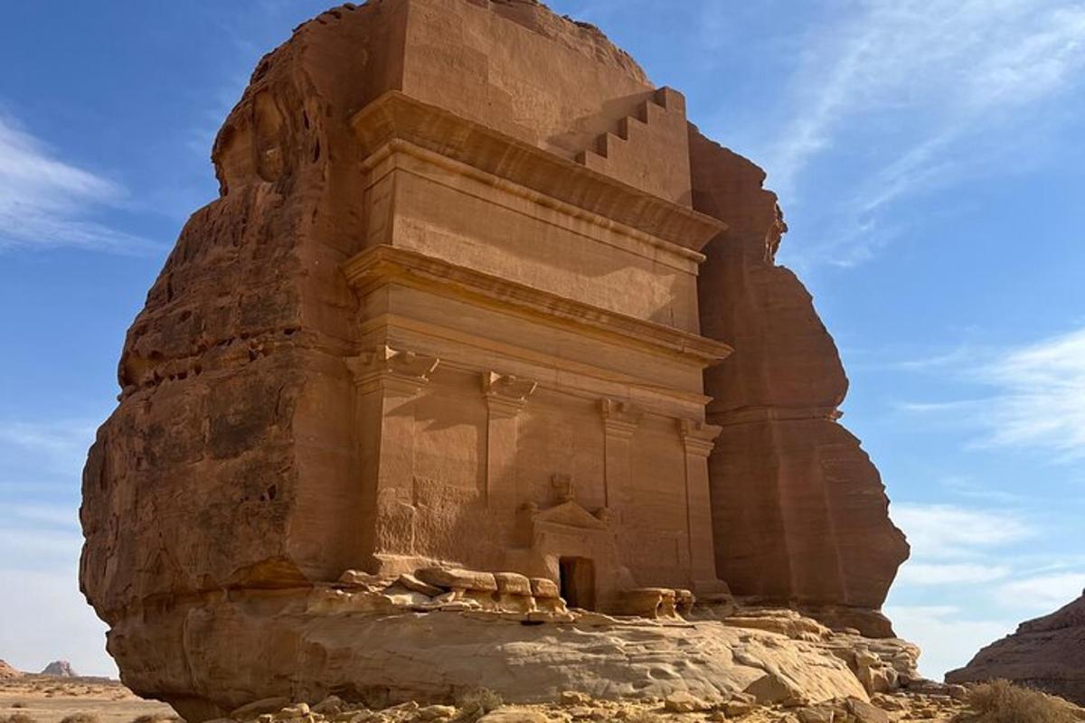 a large stone building in the desert