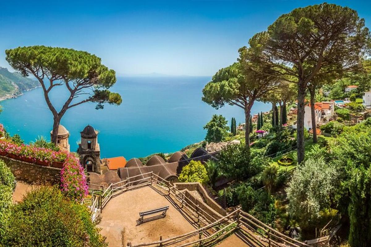 a house on a hill with a view of the ocean