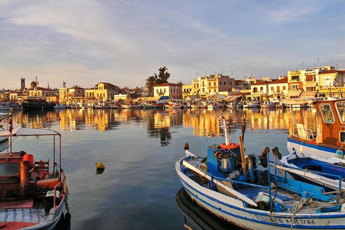 a group of boats docked in a harbor with buildings