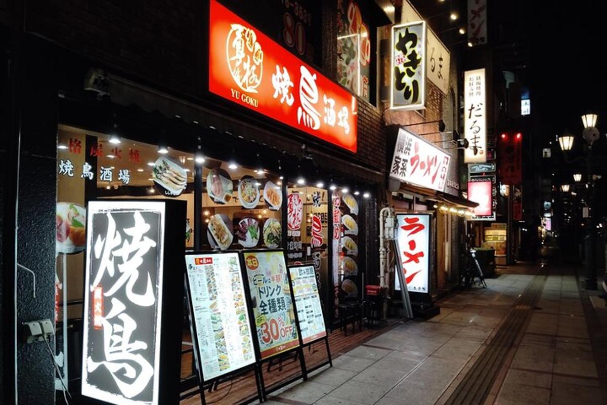 a store with signs on the side of a street