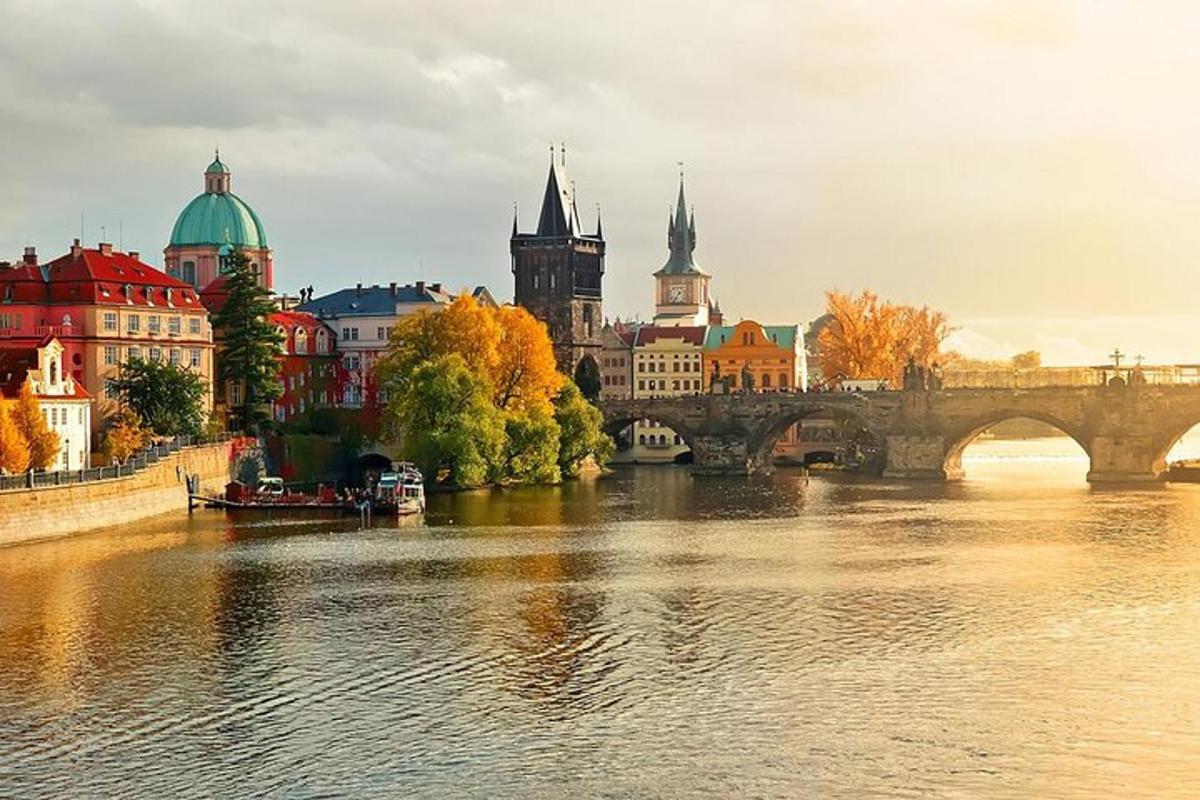 a city with a bridge and a river with buildings