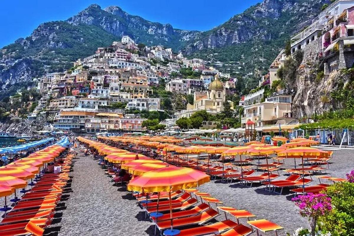 a group of umbrellas and chairs on a beach