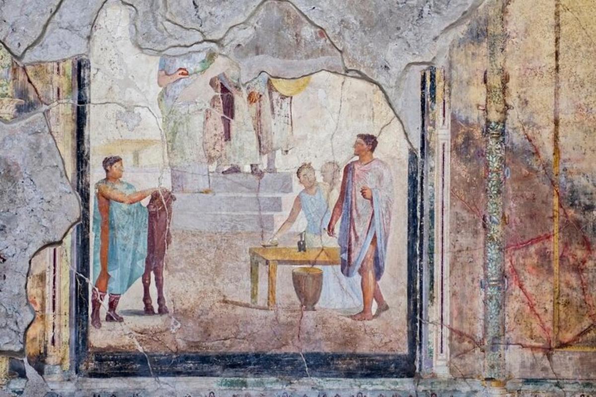 et maleri av mennesker i et rom i en hule