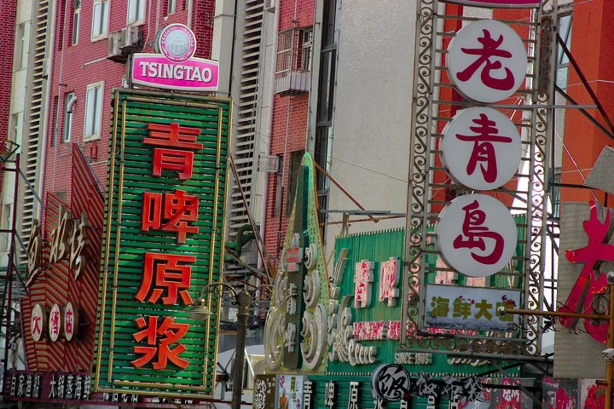 a group of signs on the side of a building