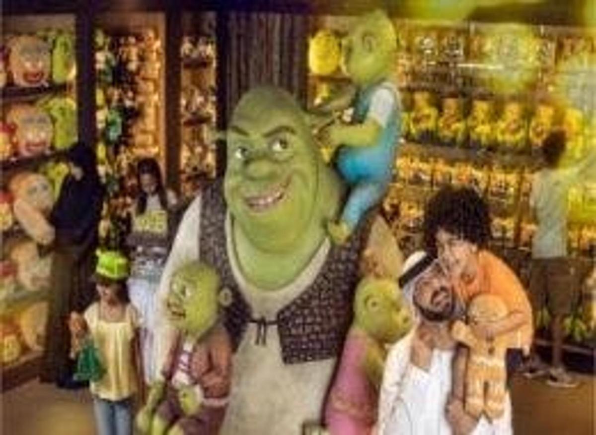 a cartoon of a man holding a bunch of dolls