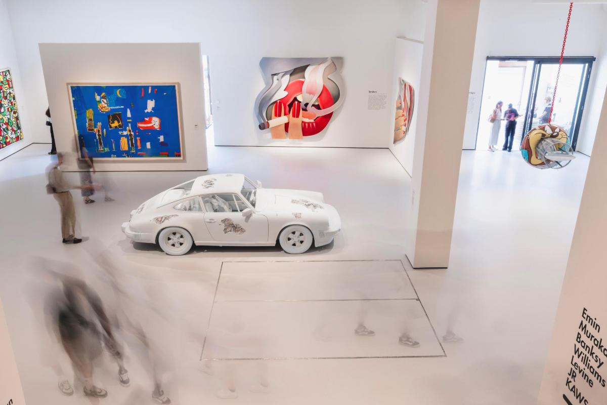 a toy car on display in a museum exhibit