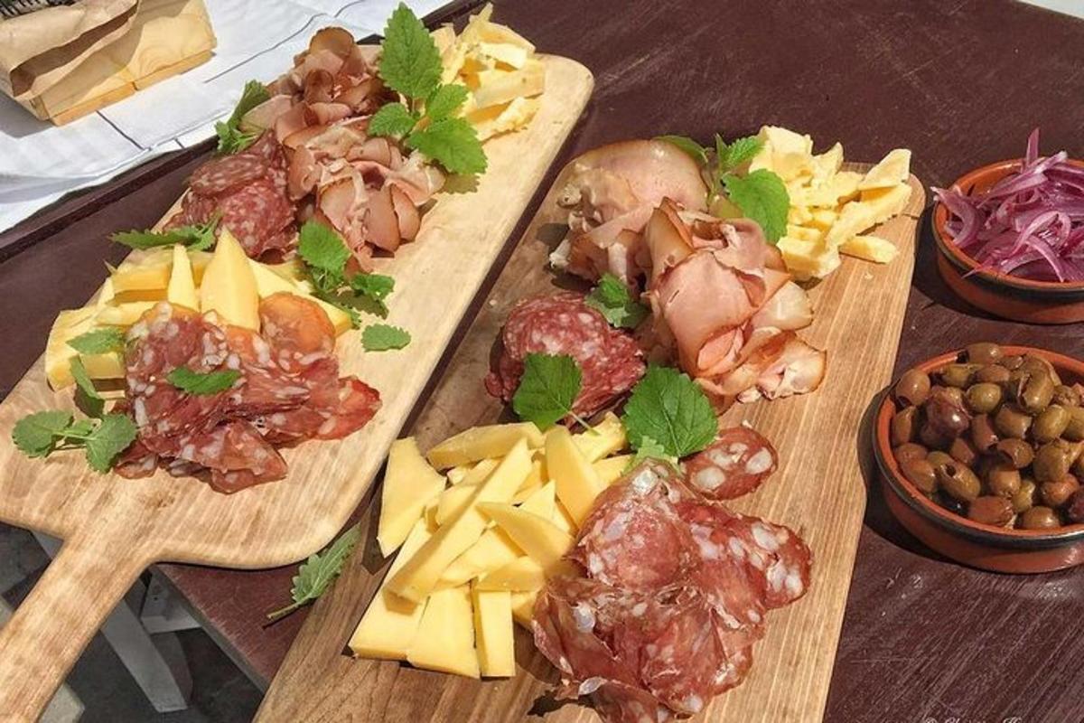 two wooden cutting boards with different types of food on them