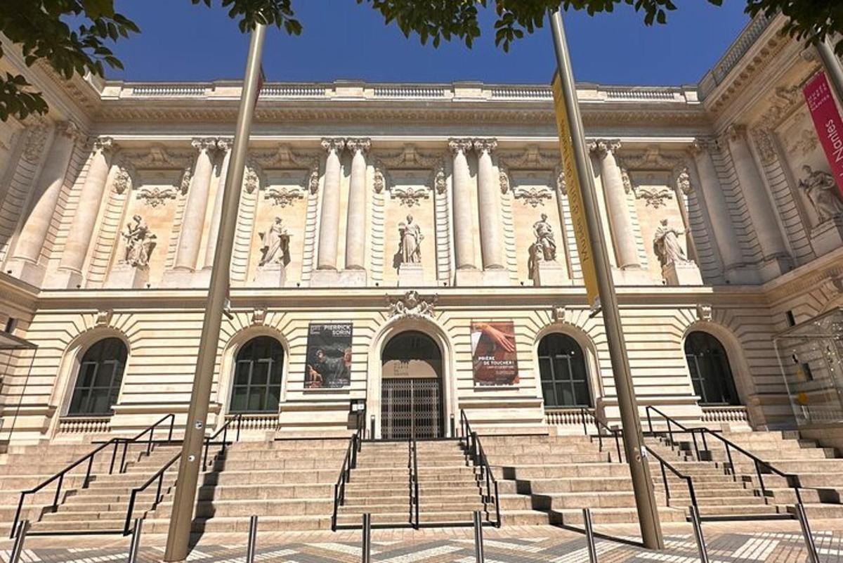 a large building with stairs in front of it