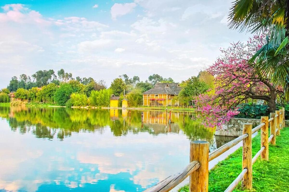 a view of a lake with a house in the background