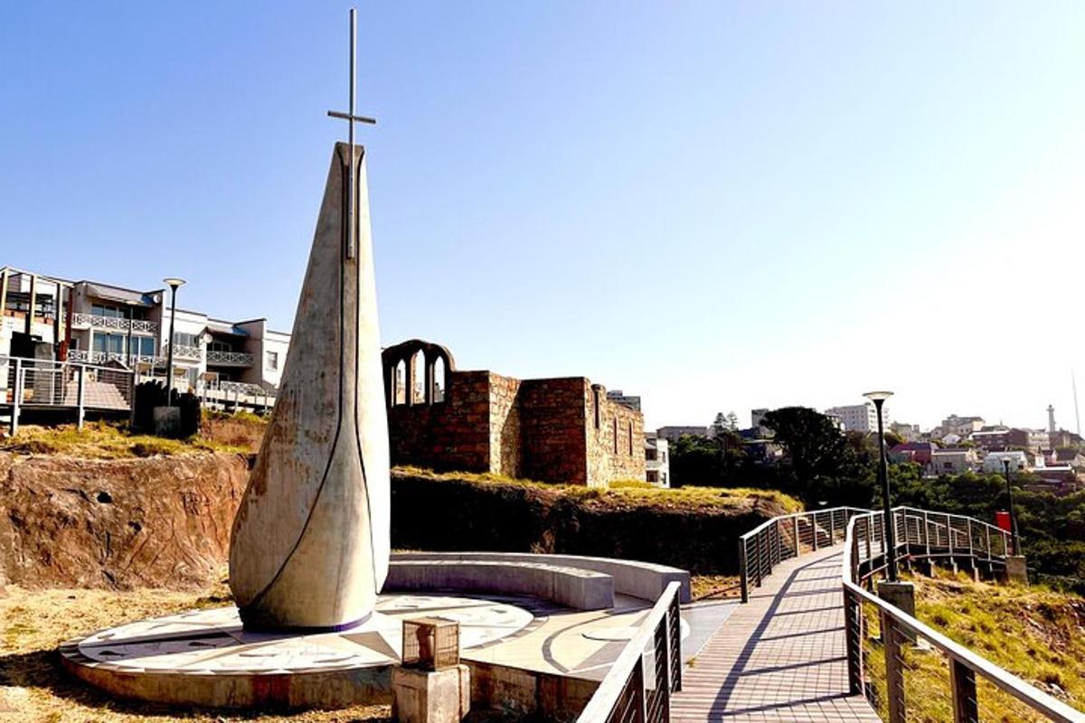 a statue of a surfboard sitting on a bench