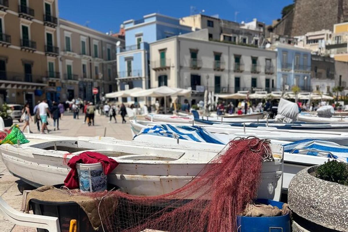 a group of boats are lined up on a street