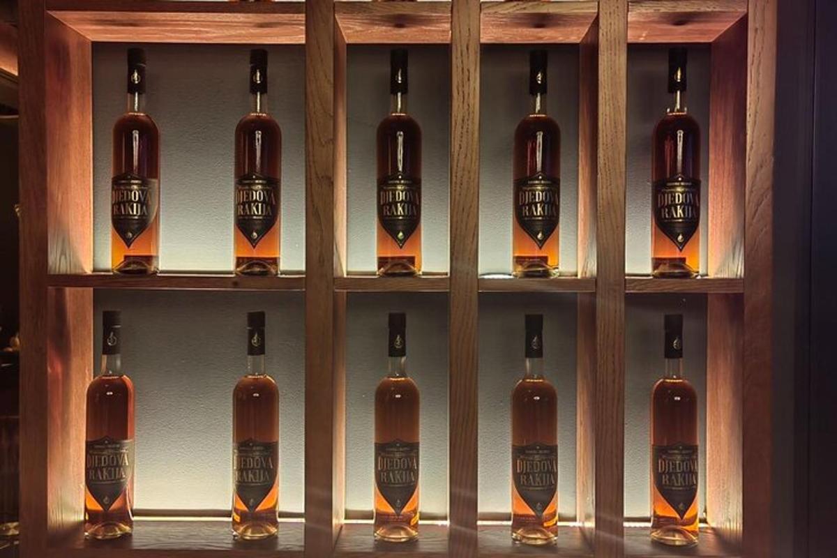 a bunch of bottles of alcohol on a shelf
