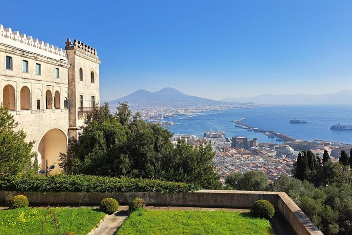 a castle with a view of the city and the ocean
