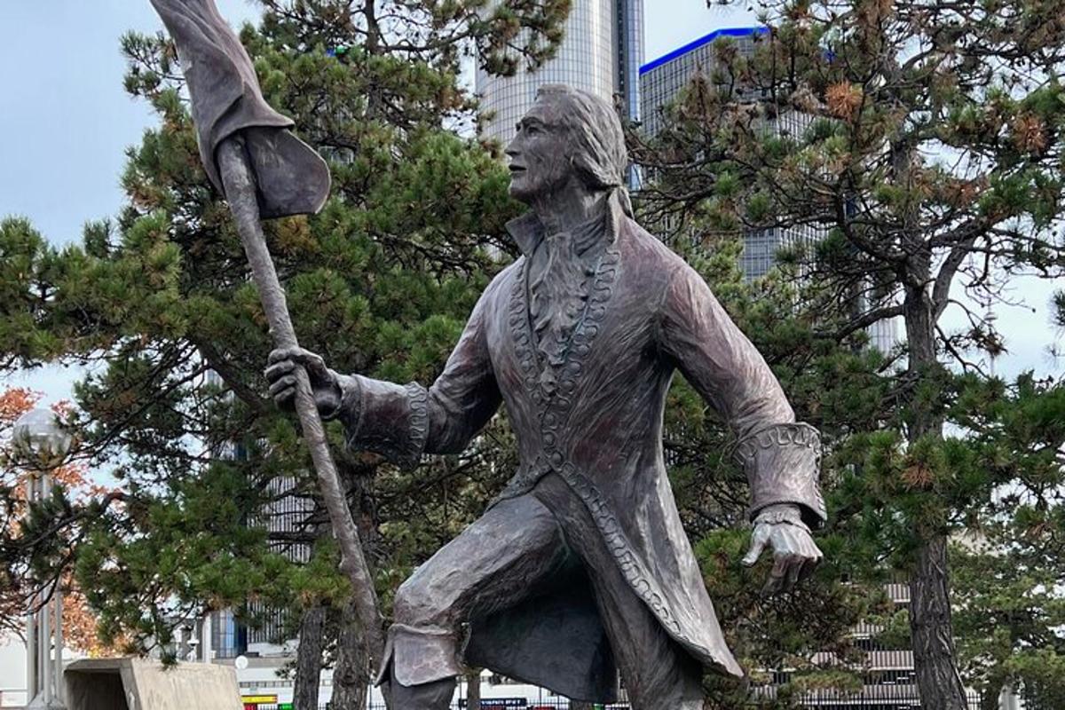 a statue of a man holding a spear