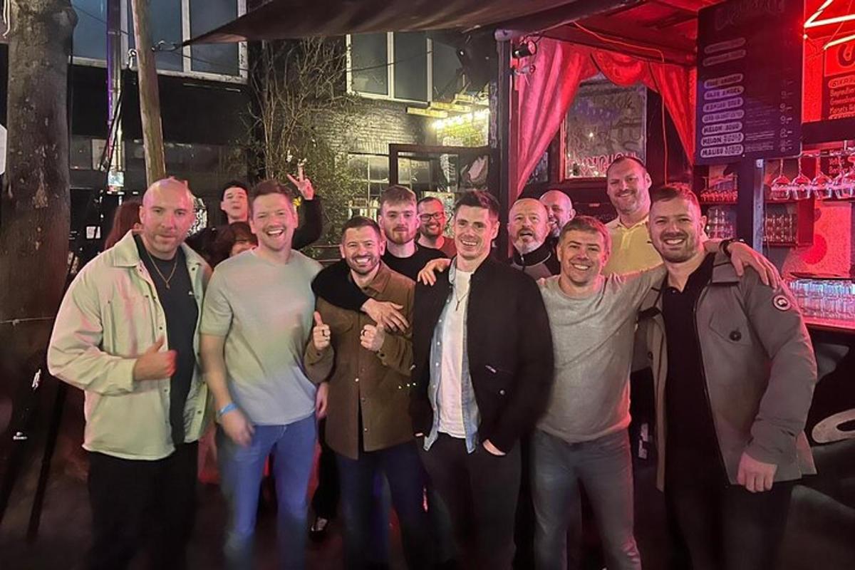 a group of men posing for a picture