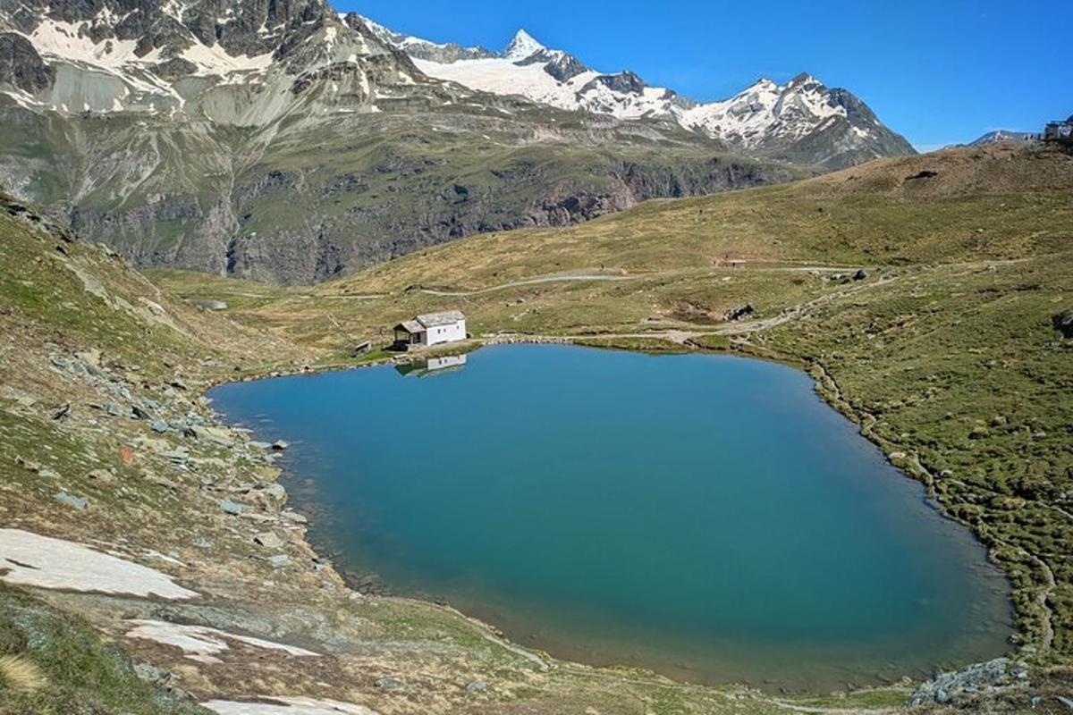 a lake in the middle of a mountain range