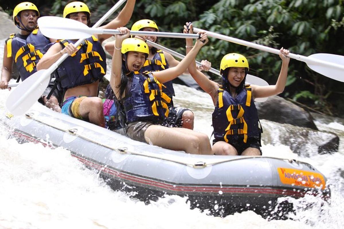 a group of people in a raft on a river