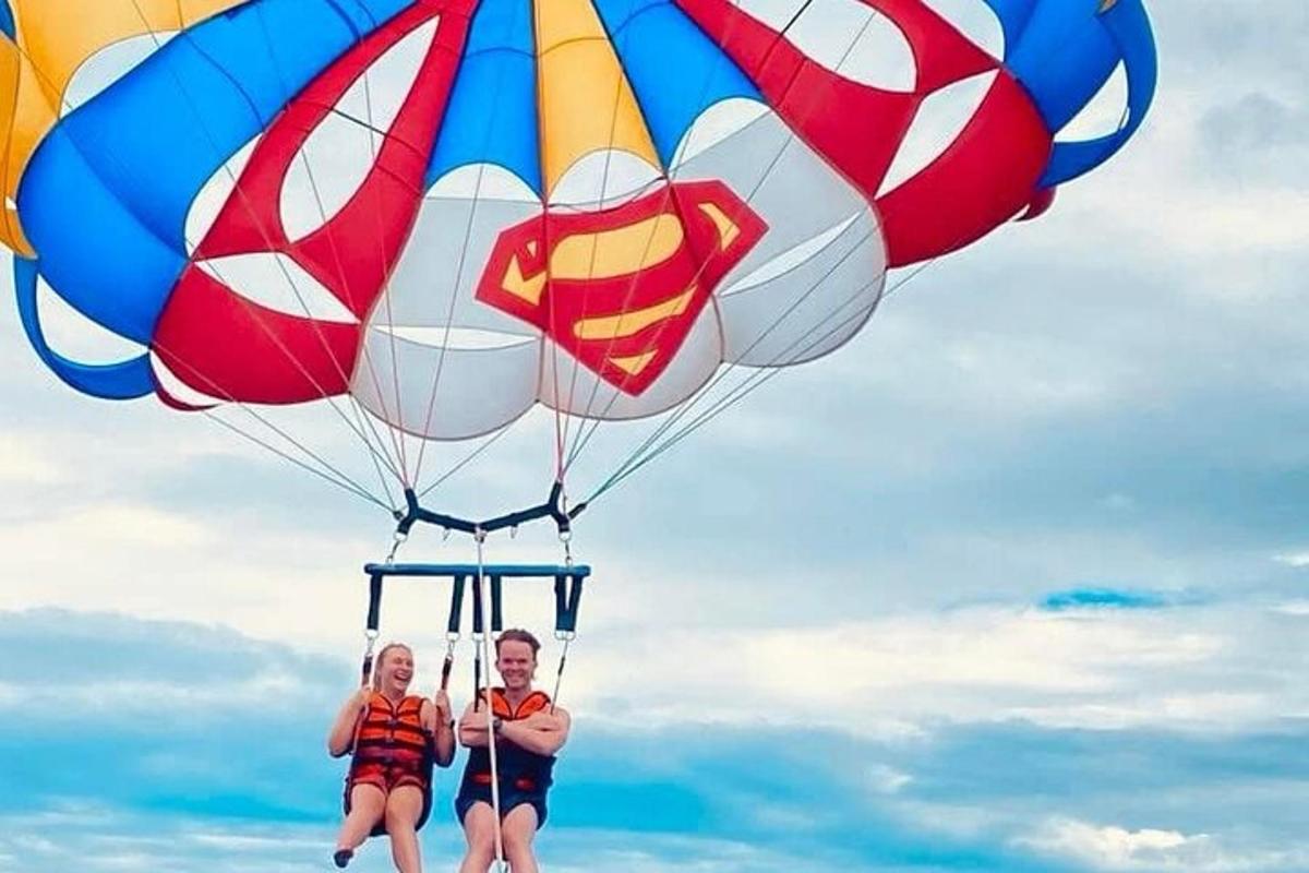 two people are riding on a hot air balloon