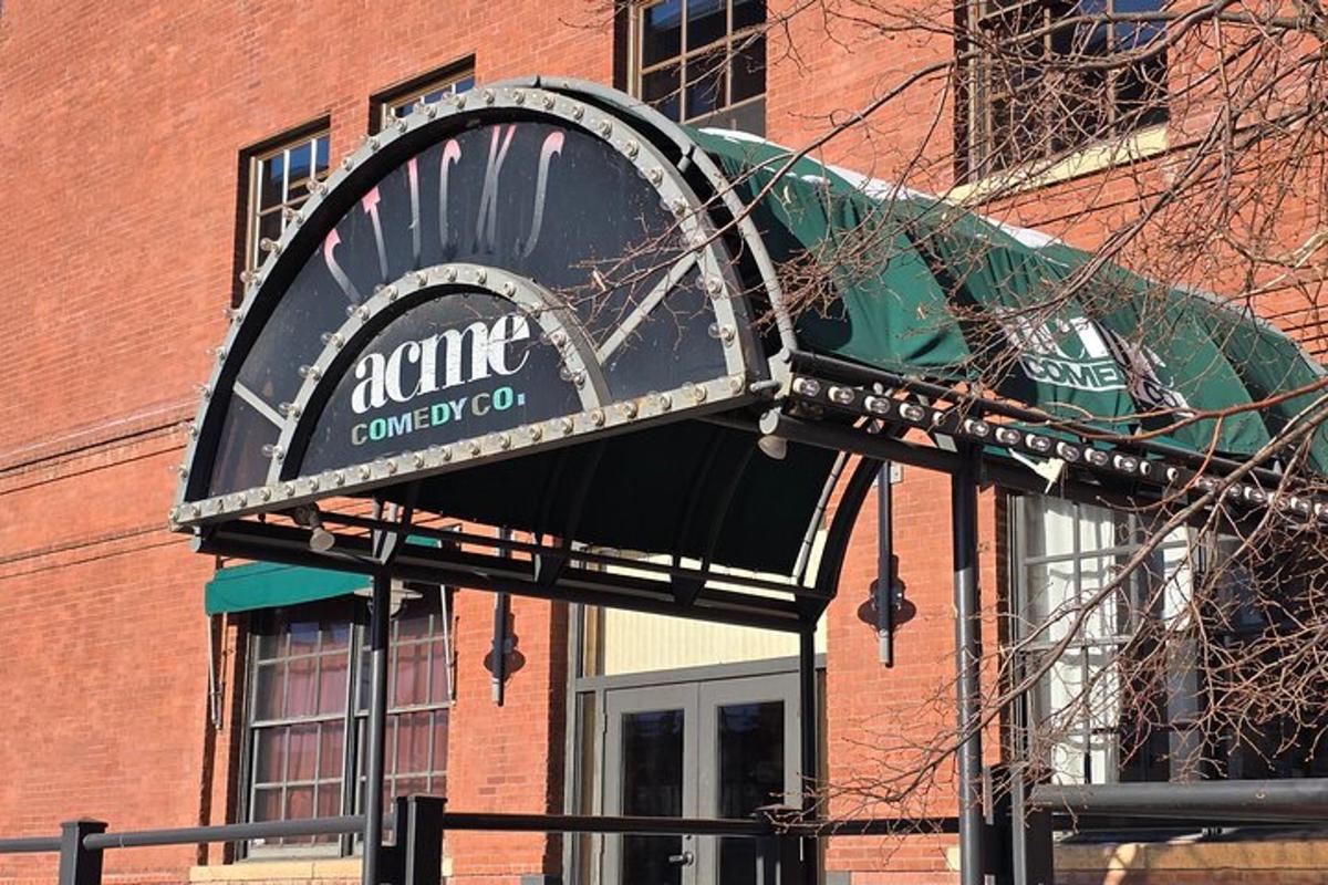 a sign for a coffee shop in front of a building