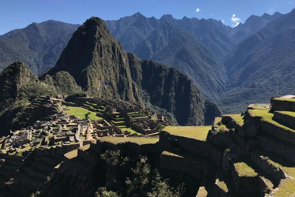 an aerial view of a village in the mountains