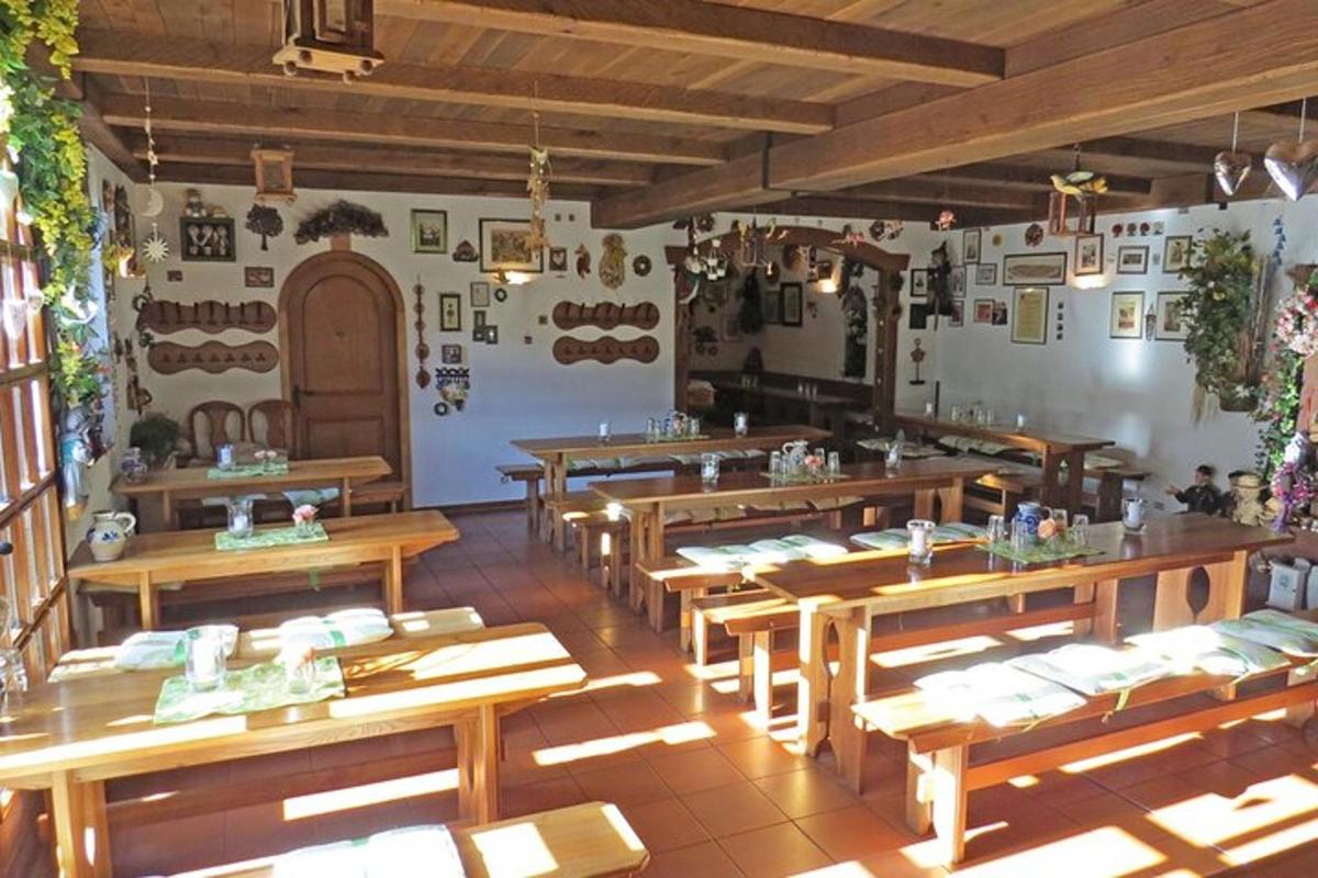 a restaurant with wooden tables in a room