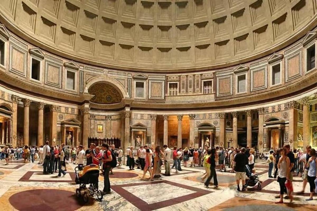 a large crowd of people in a large building