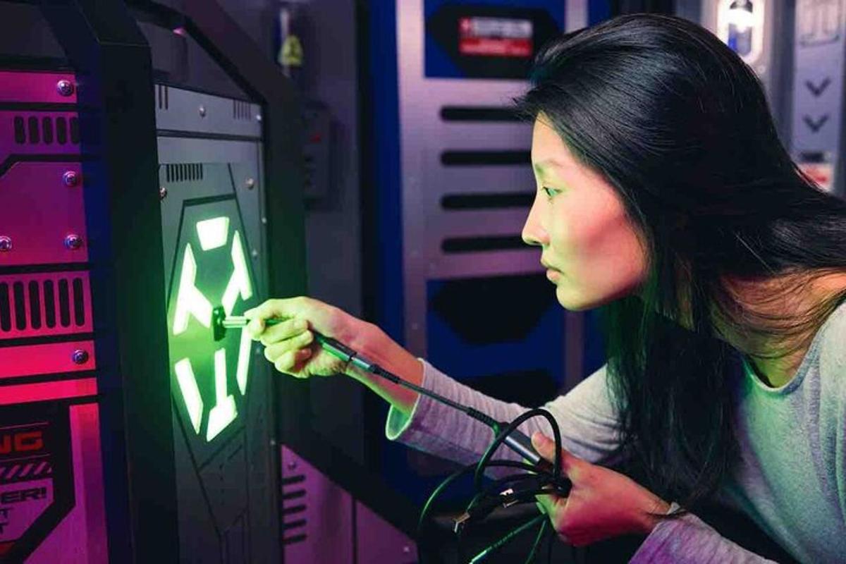 a young woman is working on a machine
