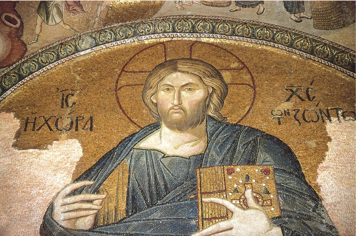 ein Gemälde eines Mannes, der ein Kreuz hält
