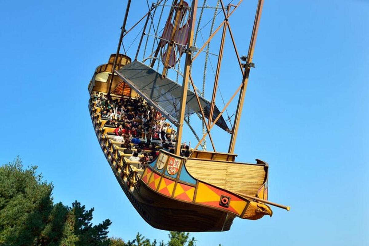a group of people riding on a pirate ship