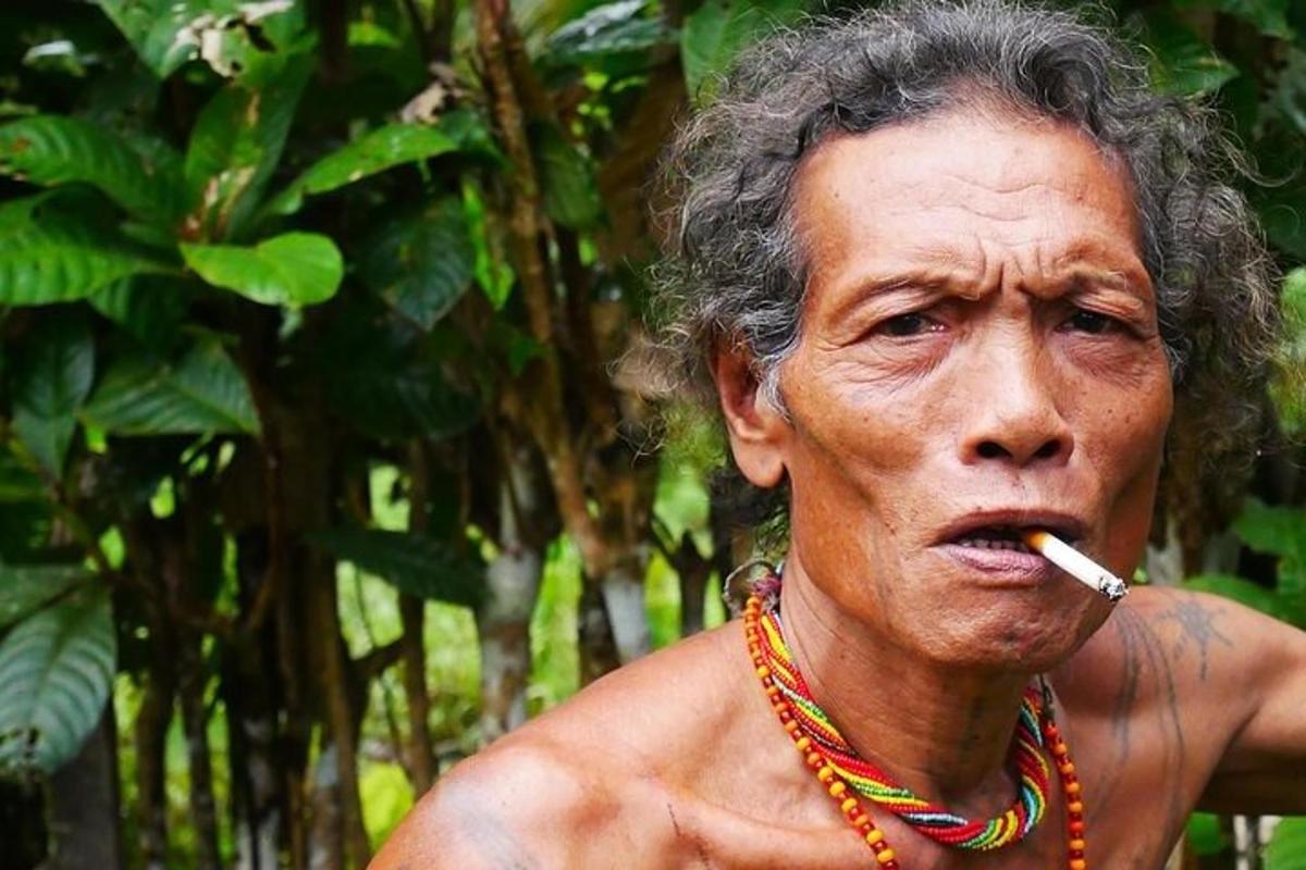 a man with a cigarette in his mouth