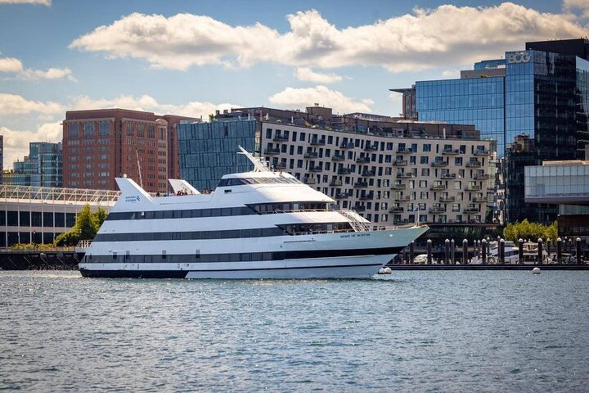 a large cruise ship in the water in a city