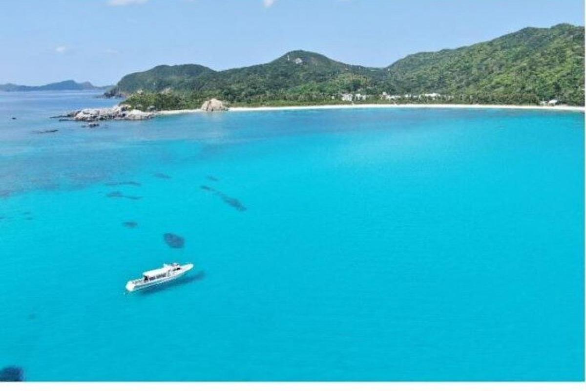 a boat in the middle of a large body of water