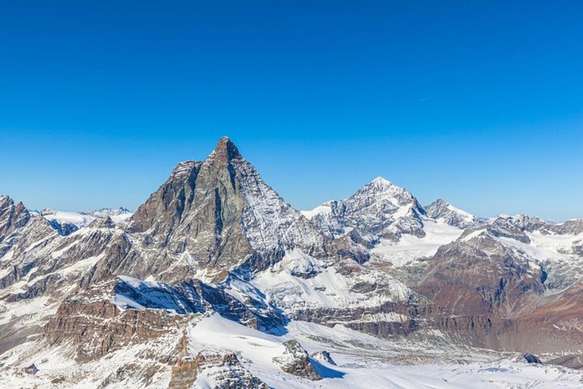 a view of a mountain with snow on it