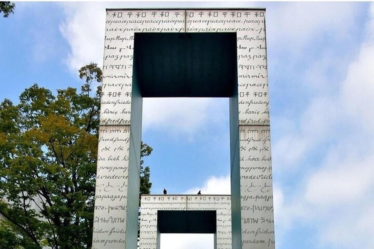 a tall monument with writing on the side of it