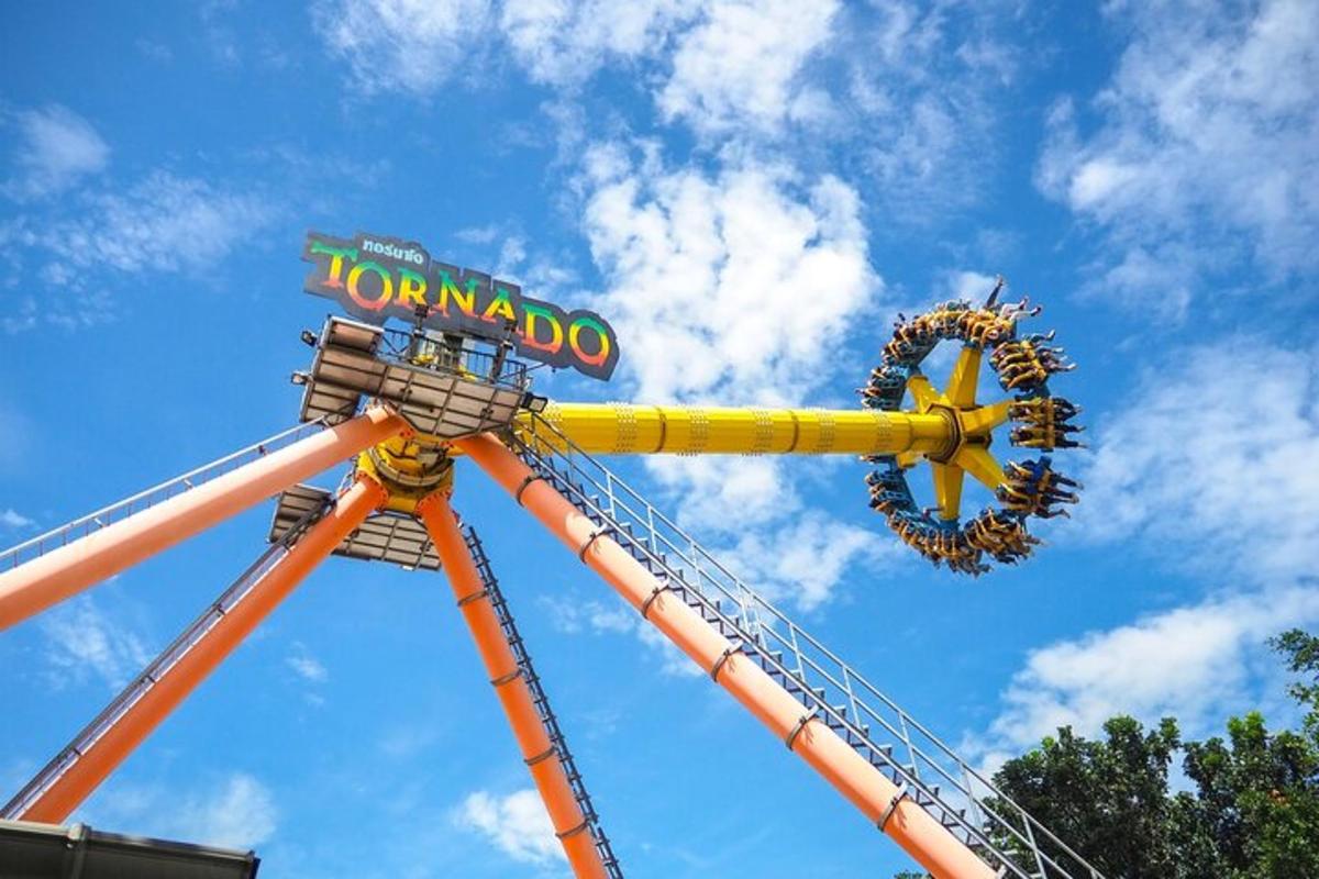 a roller coaster ride with a sign on it