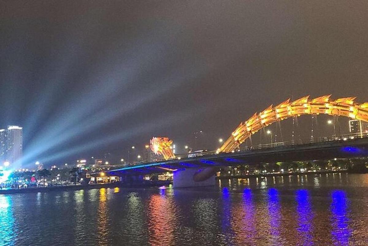 a bridge over a body of water at night