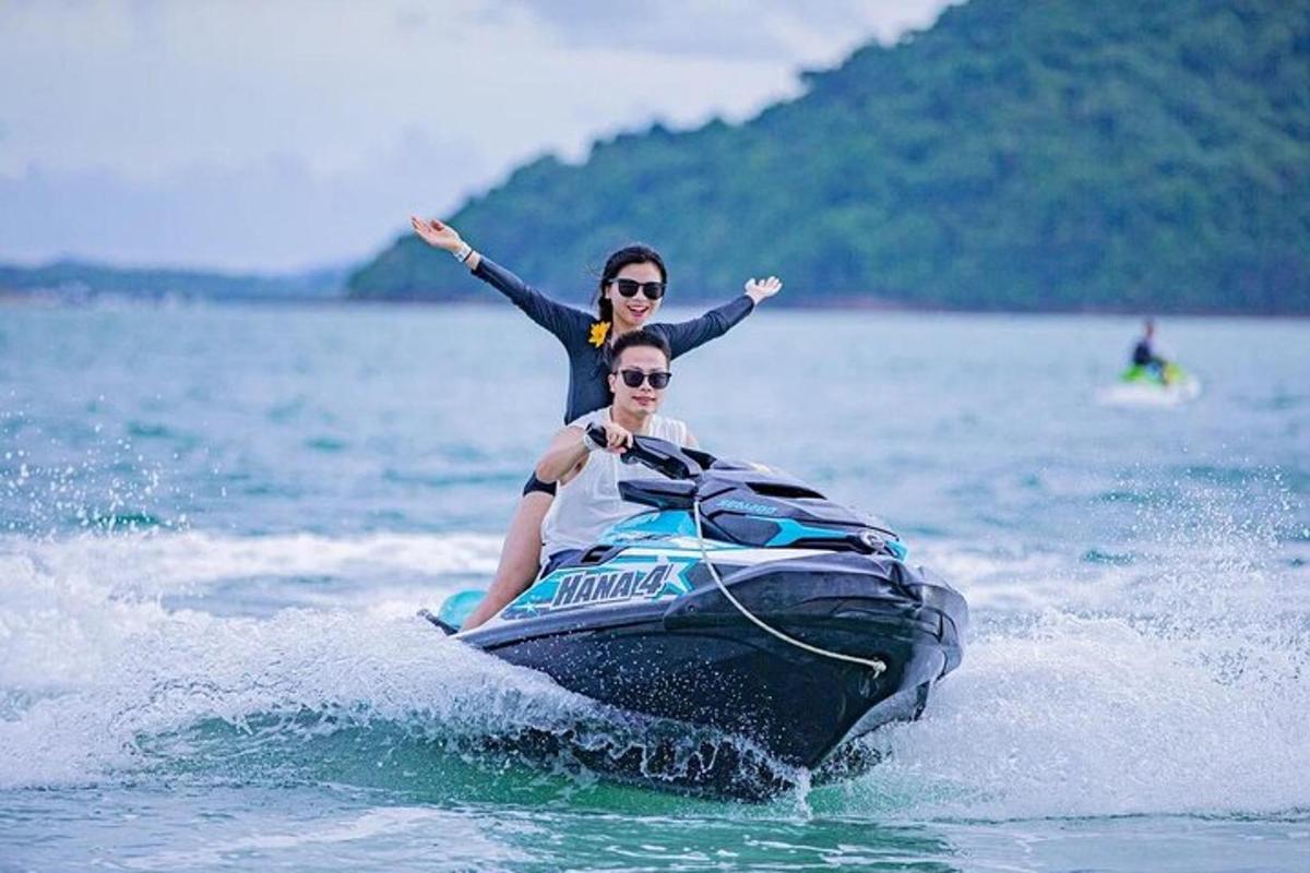 two people on a jet ski in the water