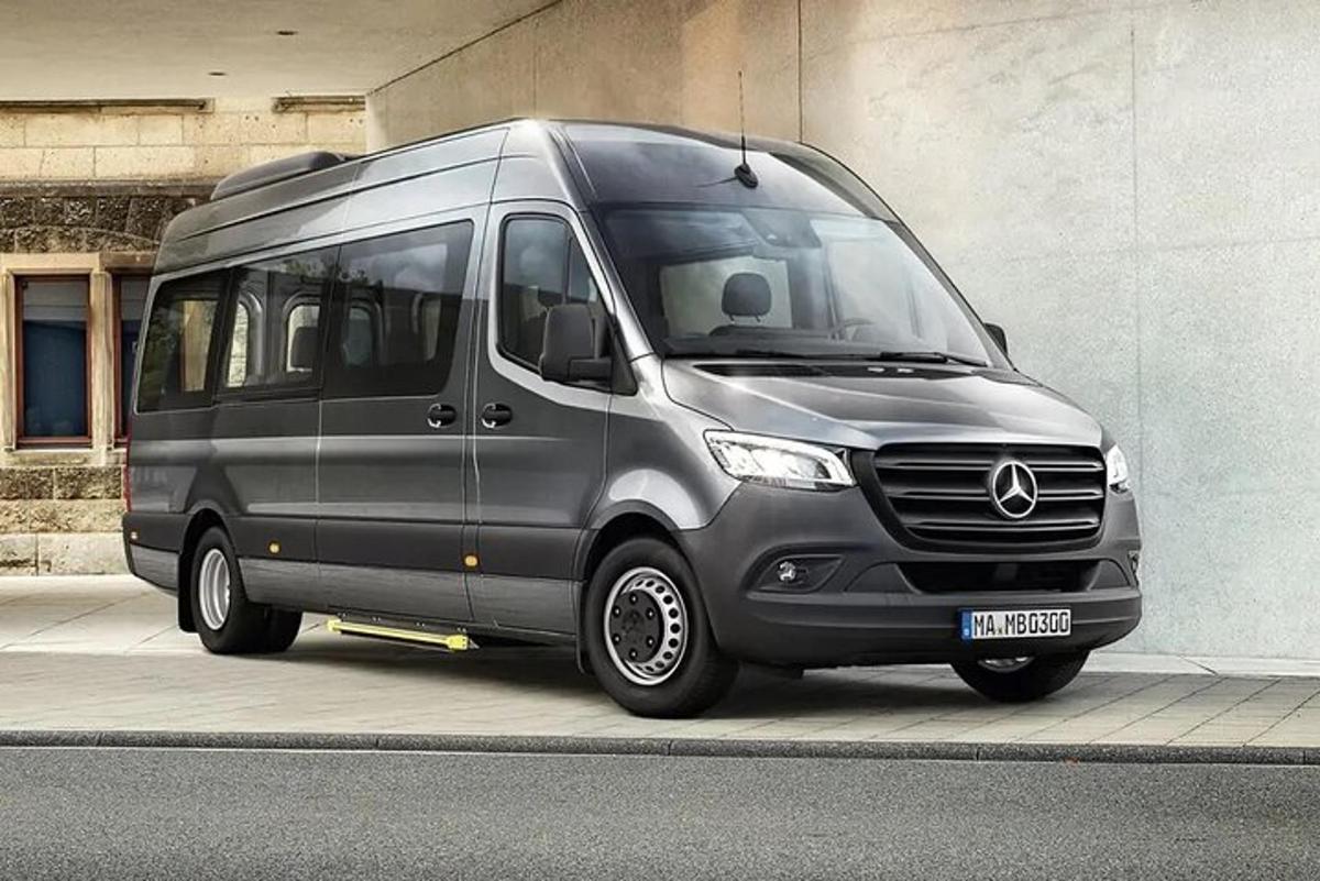 a silver van parked on the side of a street