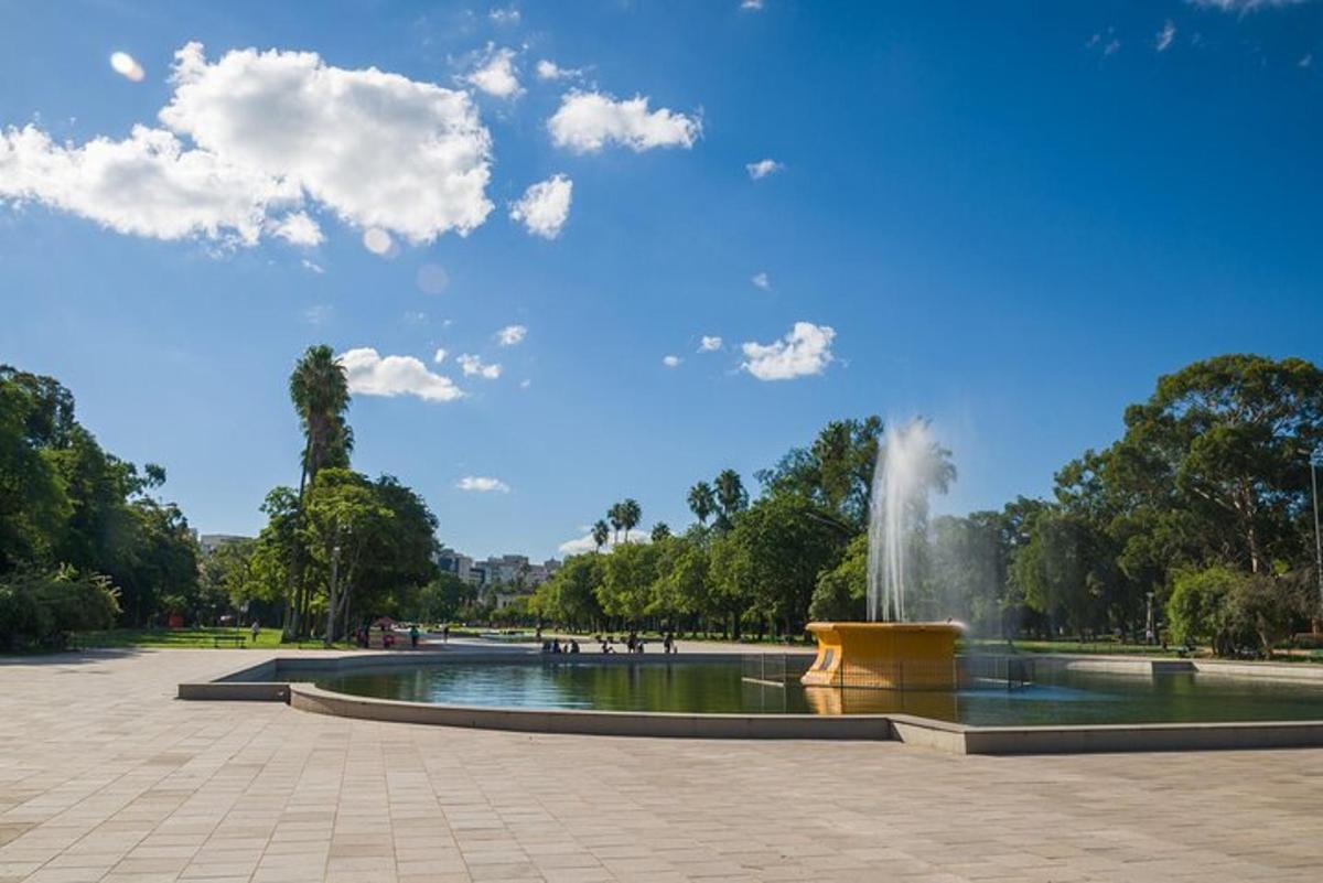 a fountain in the middle of a park