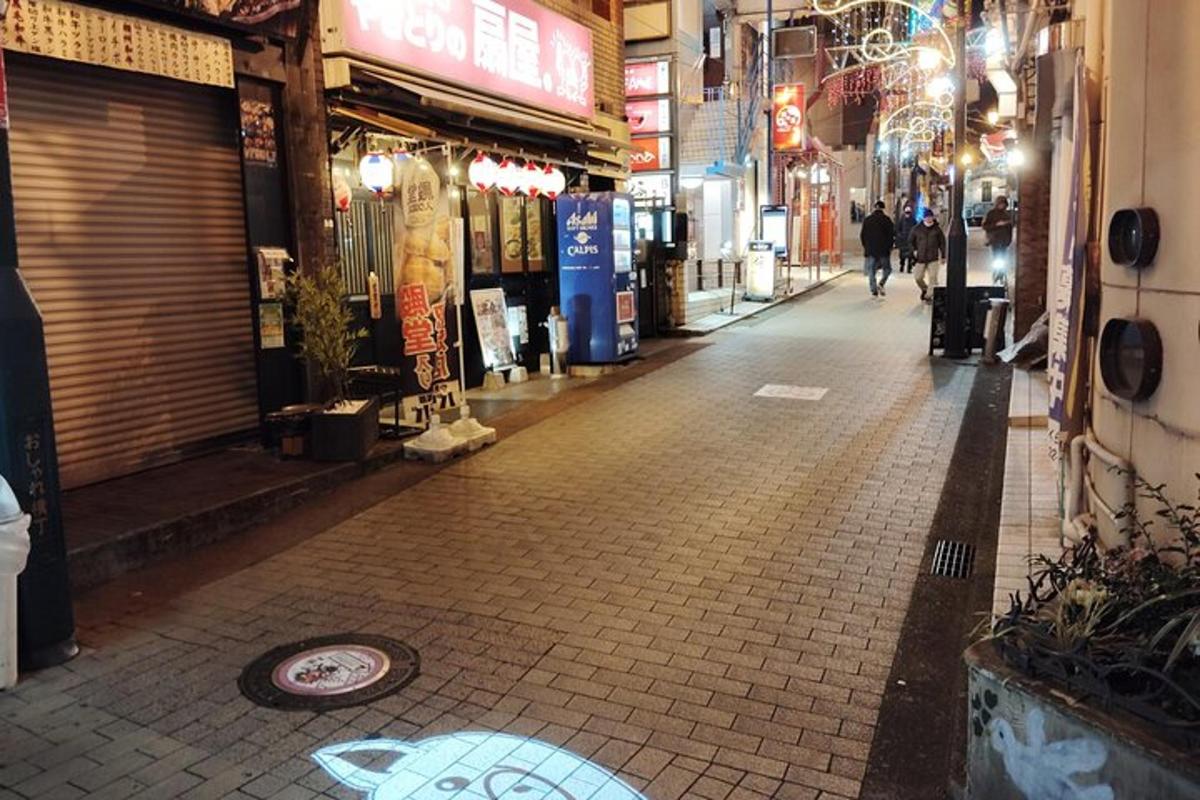 an empty street in an asian city at night