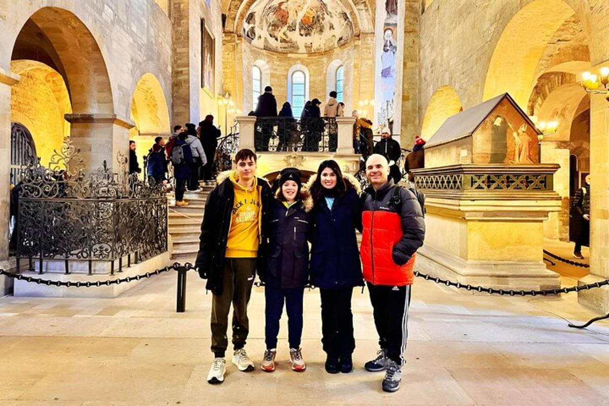 a group of people posing for a picture in a building