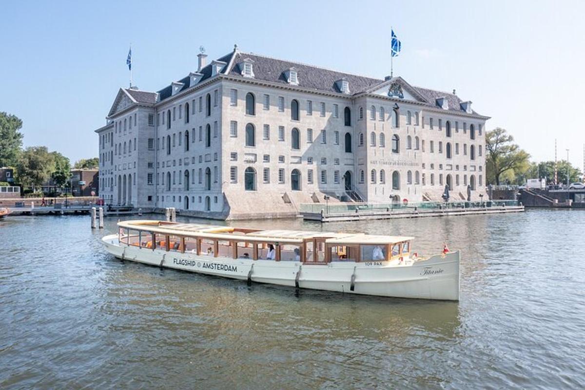 a boat in the water in front of a building