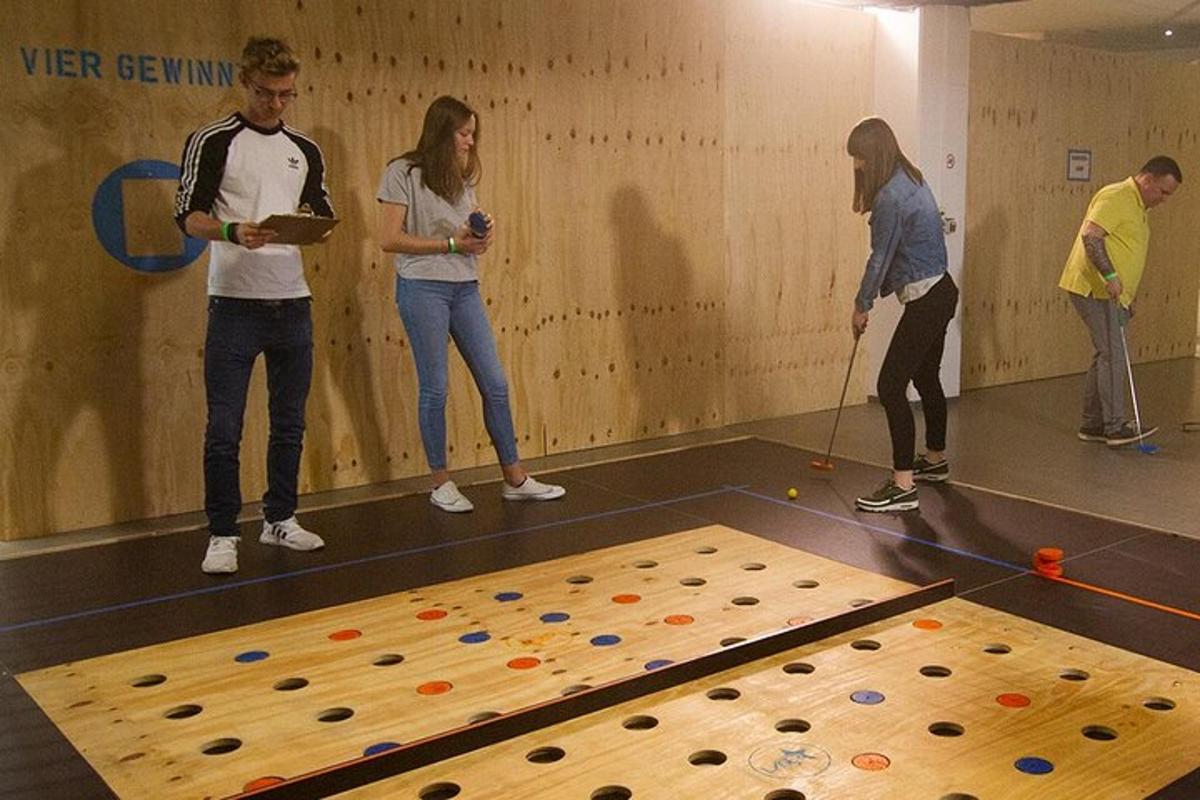 a group of people playing a game of hopscotch