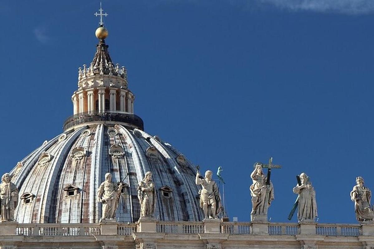 a building with statues on the top of it