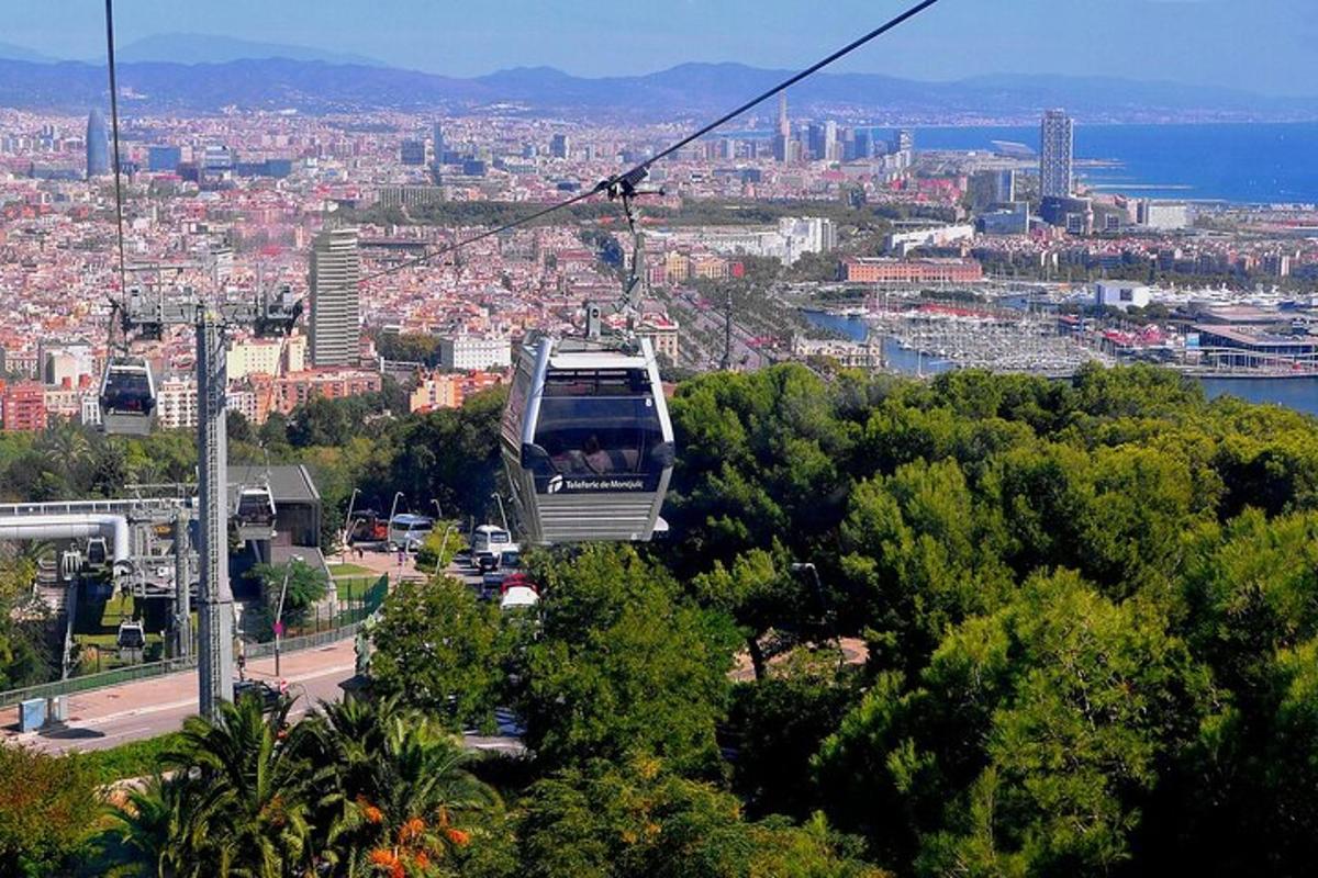 a cable car is flying over a city