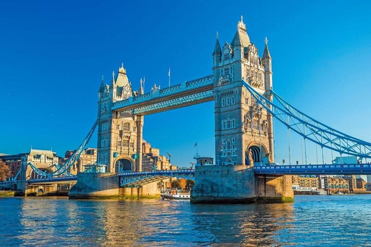 a suspension bridge in london on the water