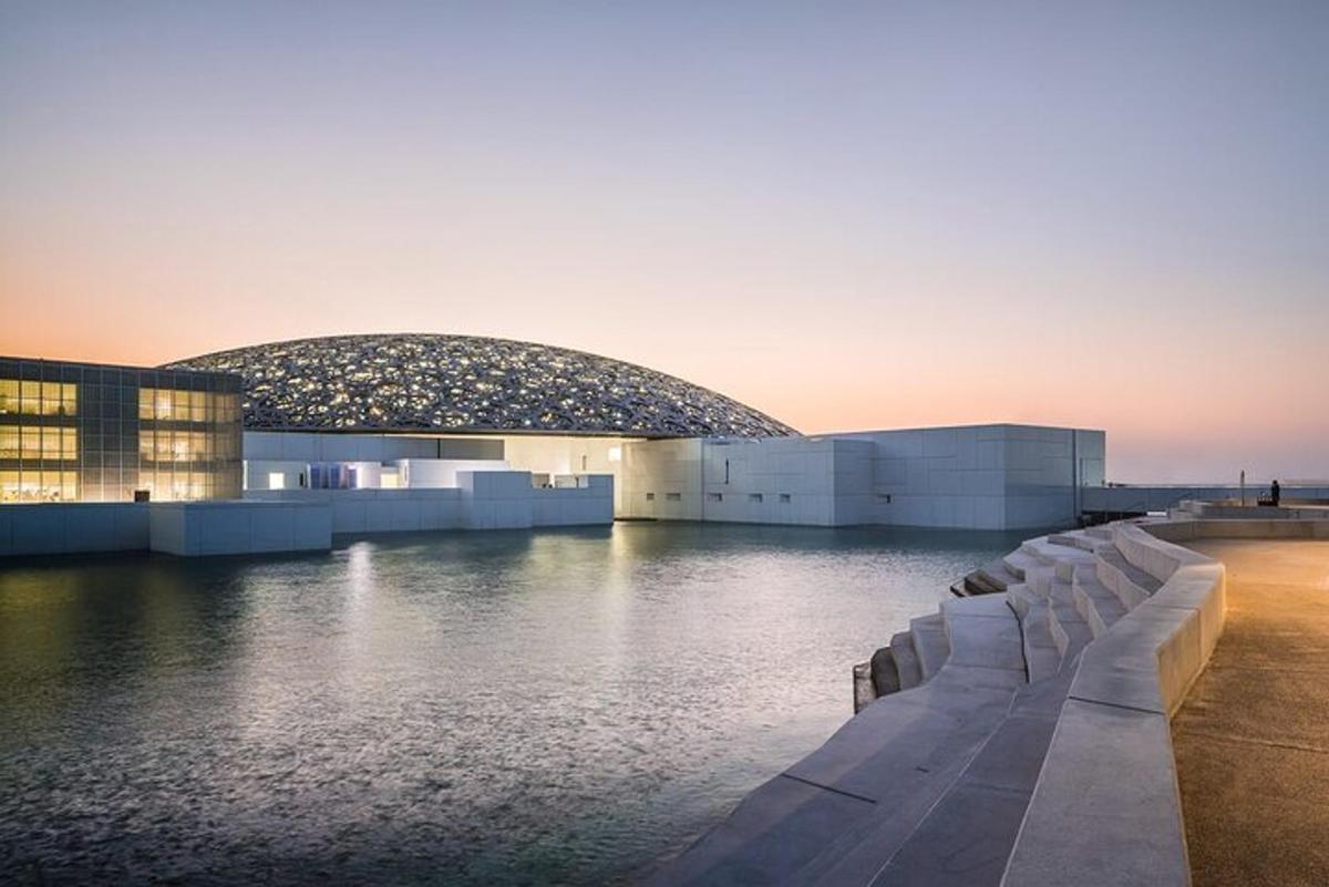 a view of a building with water in front of it