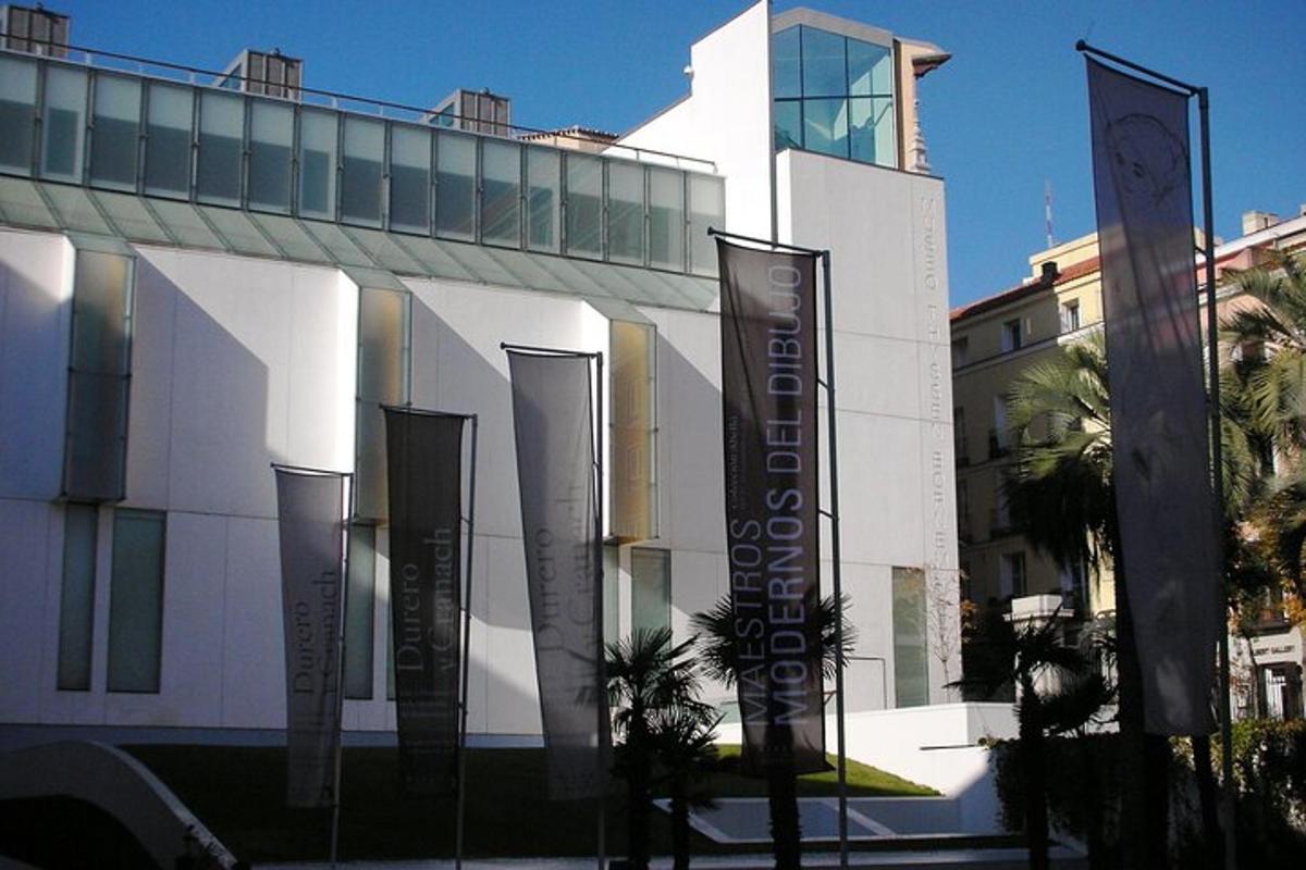 a white building with signs in front of it