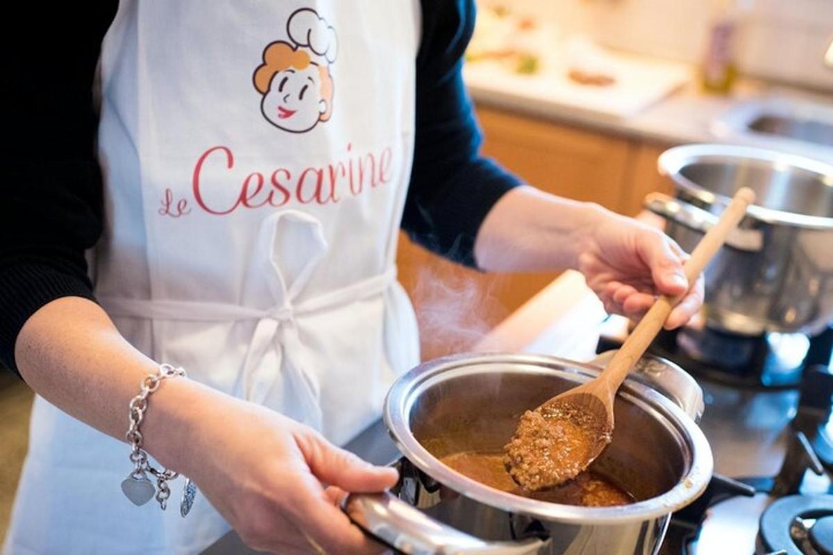 a woman in a kitchen stirring a pot of food